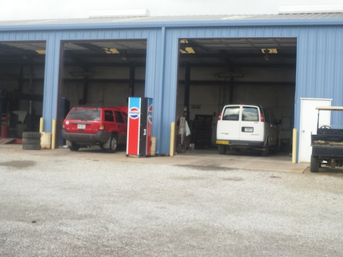 Vehicles in the service bays at Dixon Wrecking