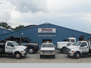 Dixon Wrecking tow truck fleet outside the shop